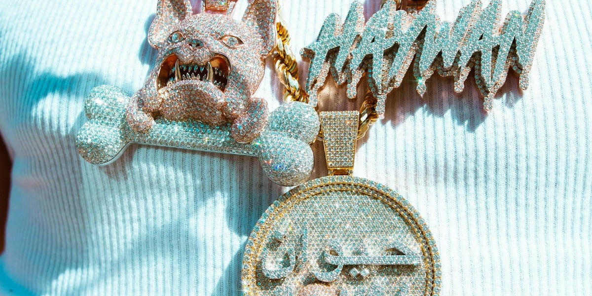 gold and silver round pendant necklace