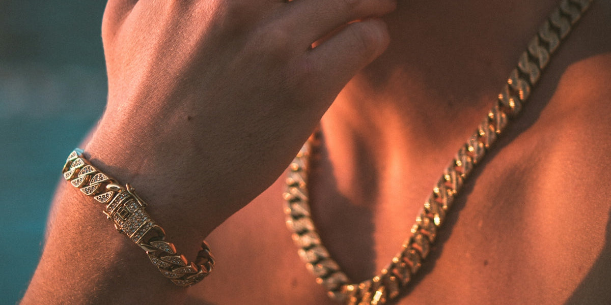 a man wearing a gold chain around his neck
