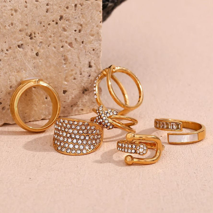 Waterproof Solid Stainless Steel 18k Gold Hollow Round CZ Micro Pave Rings Collection