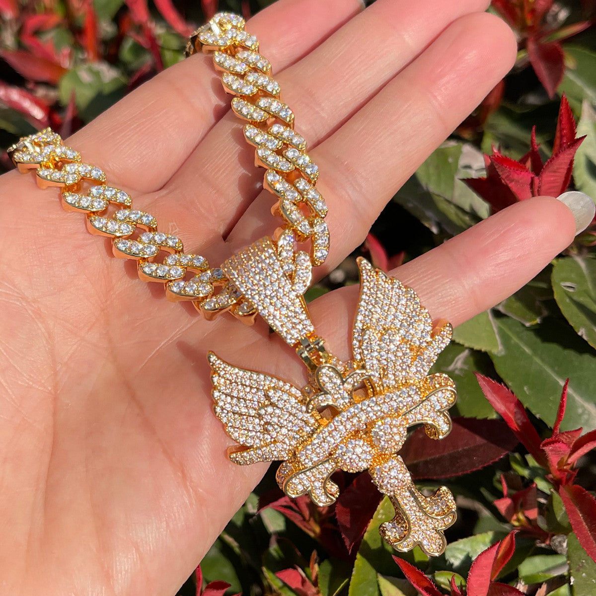The Self Righteous | Fleur De Lis Winged Iced Blinged Out 24k Cross Pendant