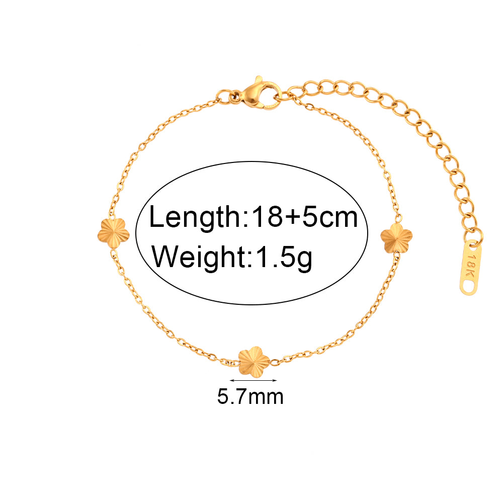 Ladies 18k Gold Over Stainless Steel Waterproof Sunburst Oval Flower Charm Bracelet