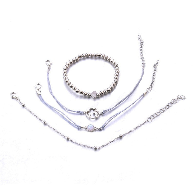 Ladies 4 Piece World Traveler Heart Bead Silver Layered Bracelet Set