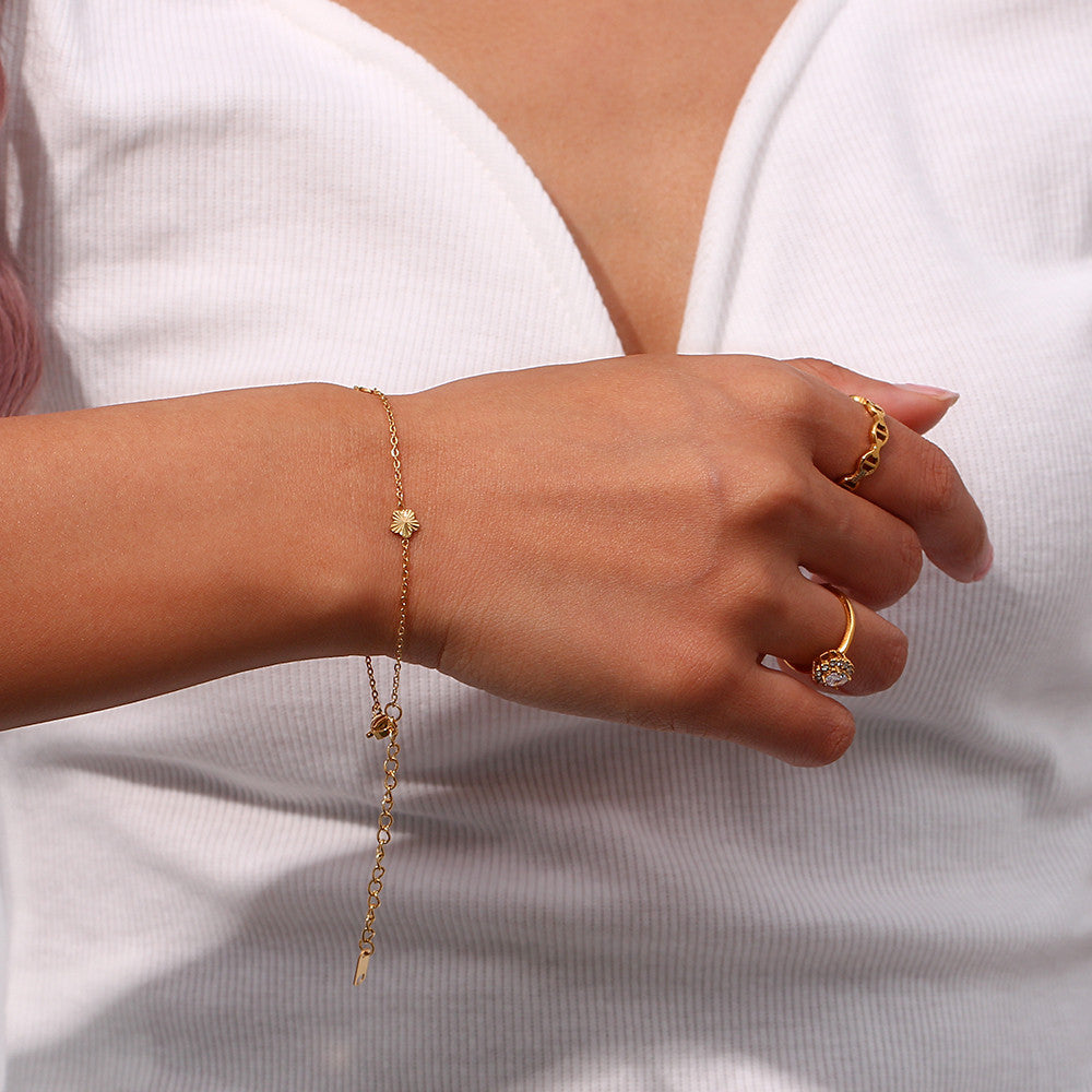 Ladies 18k Gold Over Stainless Steel Waterproof Sunburst Oval Flower Charm Bracelet