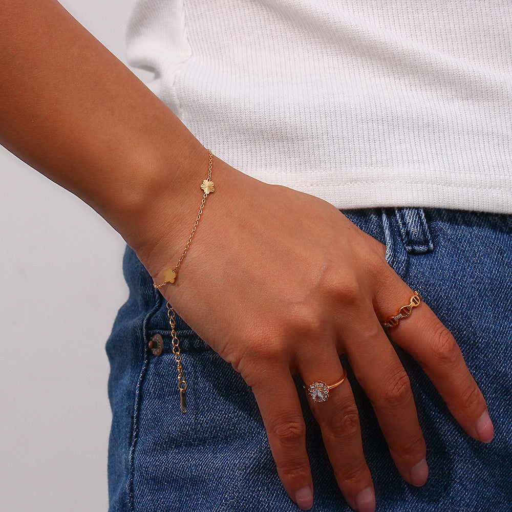 Ladies 18k Gold Over Stainless Steel Waterproof Sunburst Oval Flower Charm Bracelet