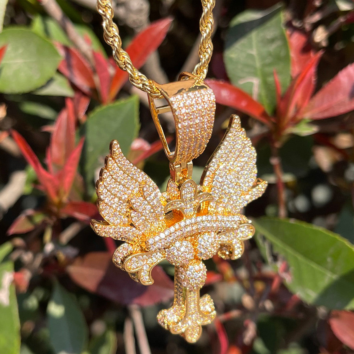 The Self Righteous | Fleur De Lis Winged Iced Blinged Out 24k Cross Pendant