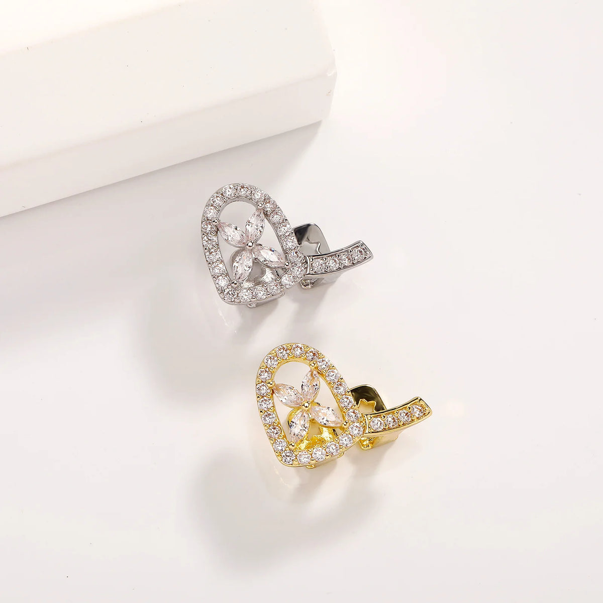 The Flower | Double Four-leaf Flower Iced Blinged  Out Hollow Horizontal Bar Tooth Grillz