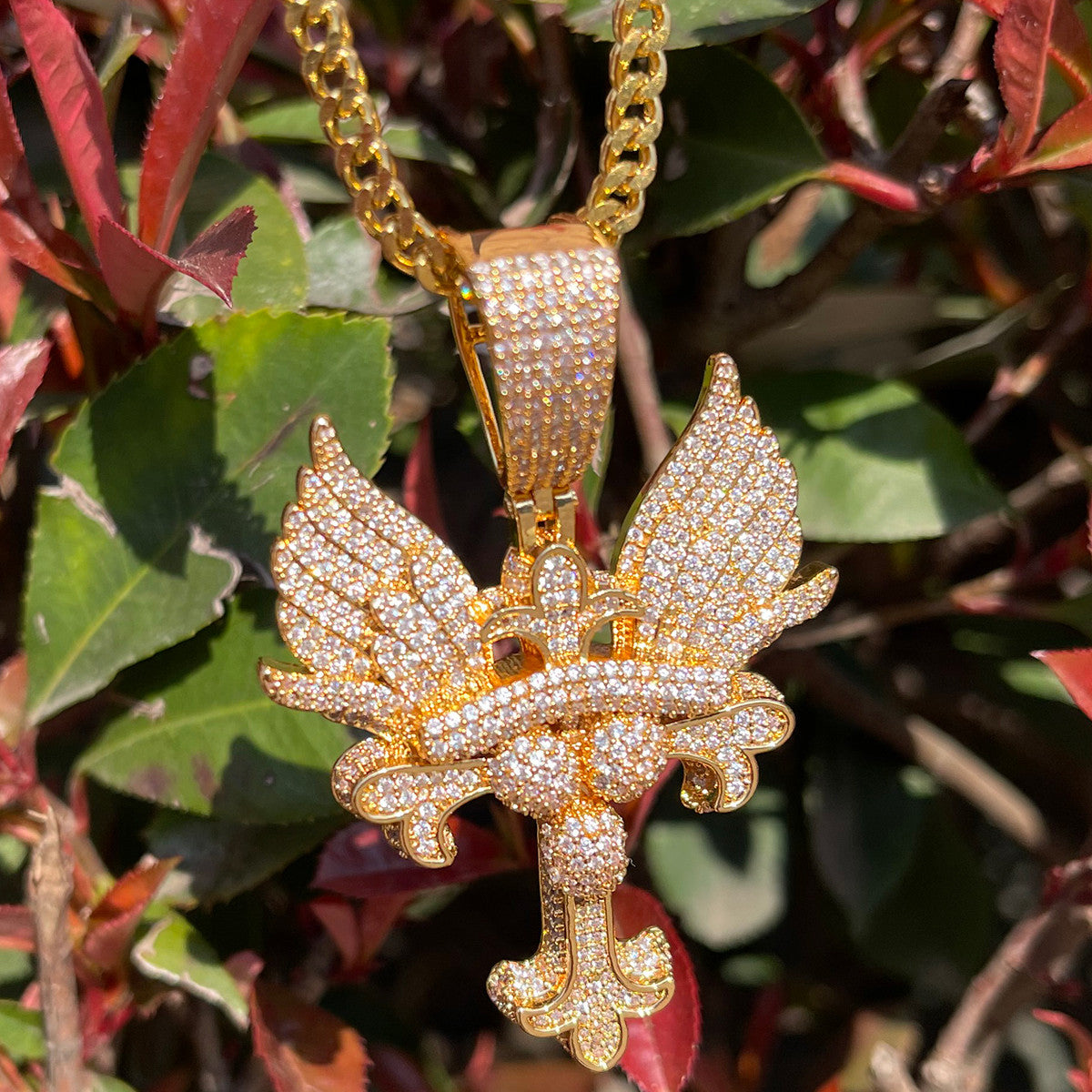 The Self Righteous | Fleur De Lis Winged Iced Blinged Out 24k Cross Pendant
