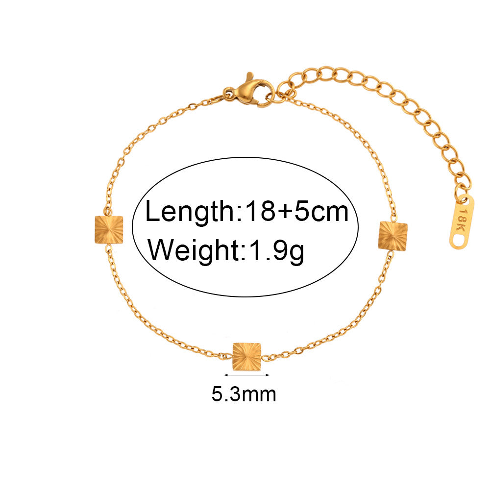 Ladies 18k Gold Over Stainless Steel Waterproof Sunburst Oval Flower Charm Bracelet